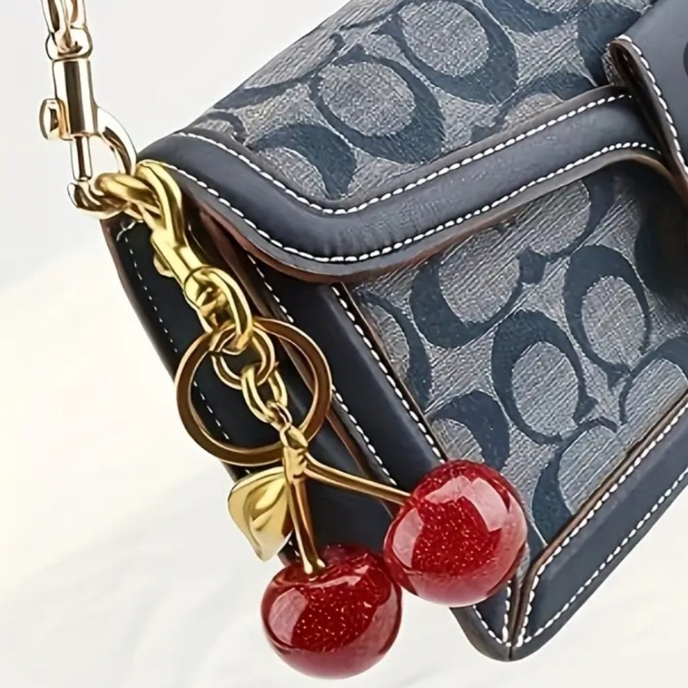New in package Quality red cherry charm and key chain